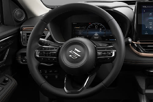 Suzuki Across Steering Wheel